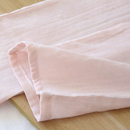 Soft light pink cotton gauze fabric detail of three-piece women's pajamas set